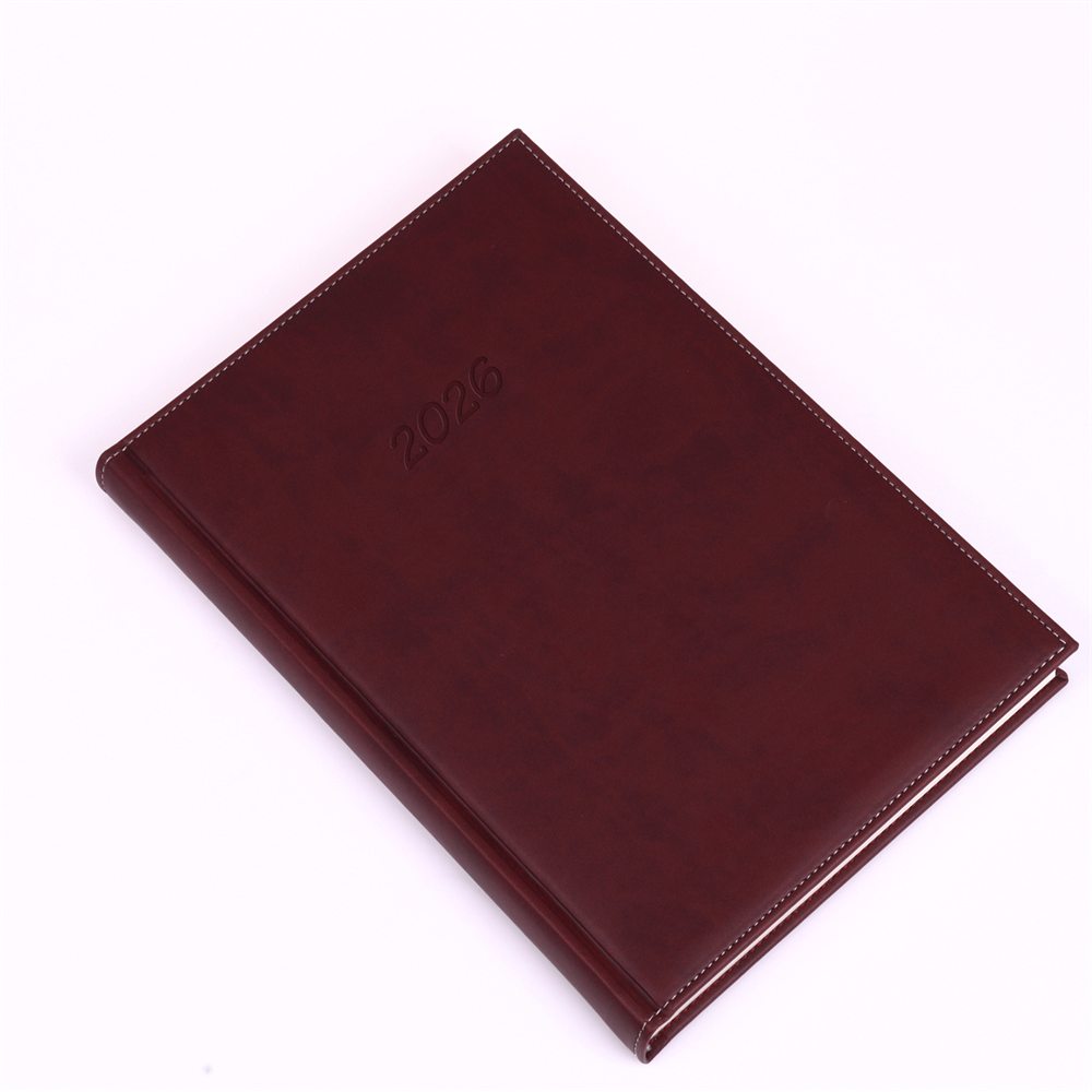 Határidőnapló Bolero B/5, napi krémszínű lapokkal barna Realsystem 2026.